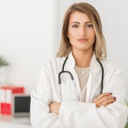 Female doctor in a white coat with a stethoscope, representing verified medical professionals for healthcare contact lists